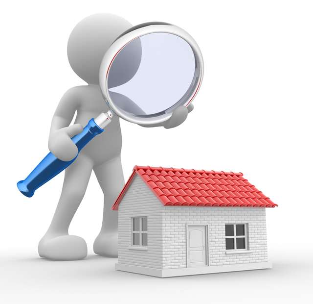 House and magnify glass Stock Photo